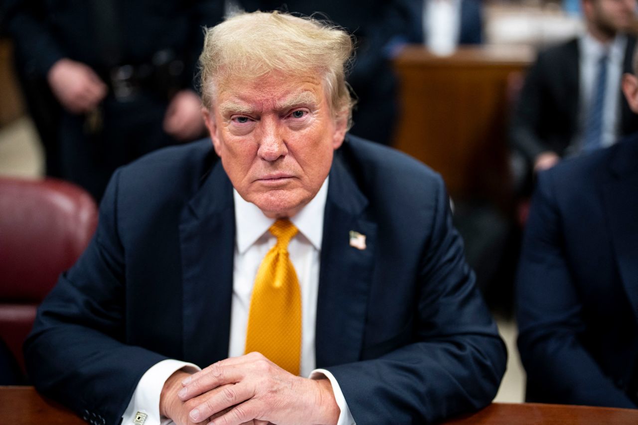 Former President Donald Trump sits in a courtroom at Manhattan Criminal Court in New York on Thursday.