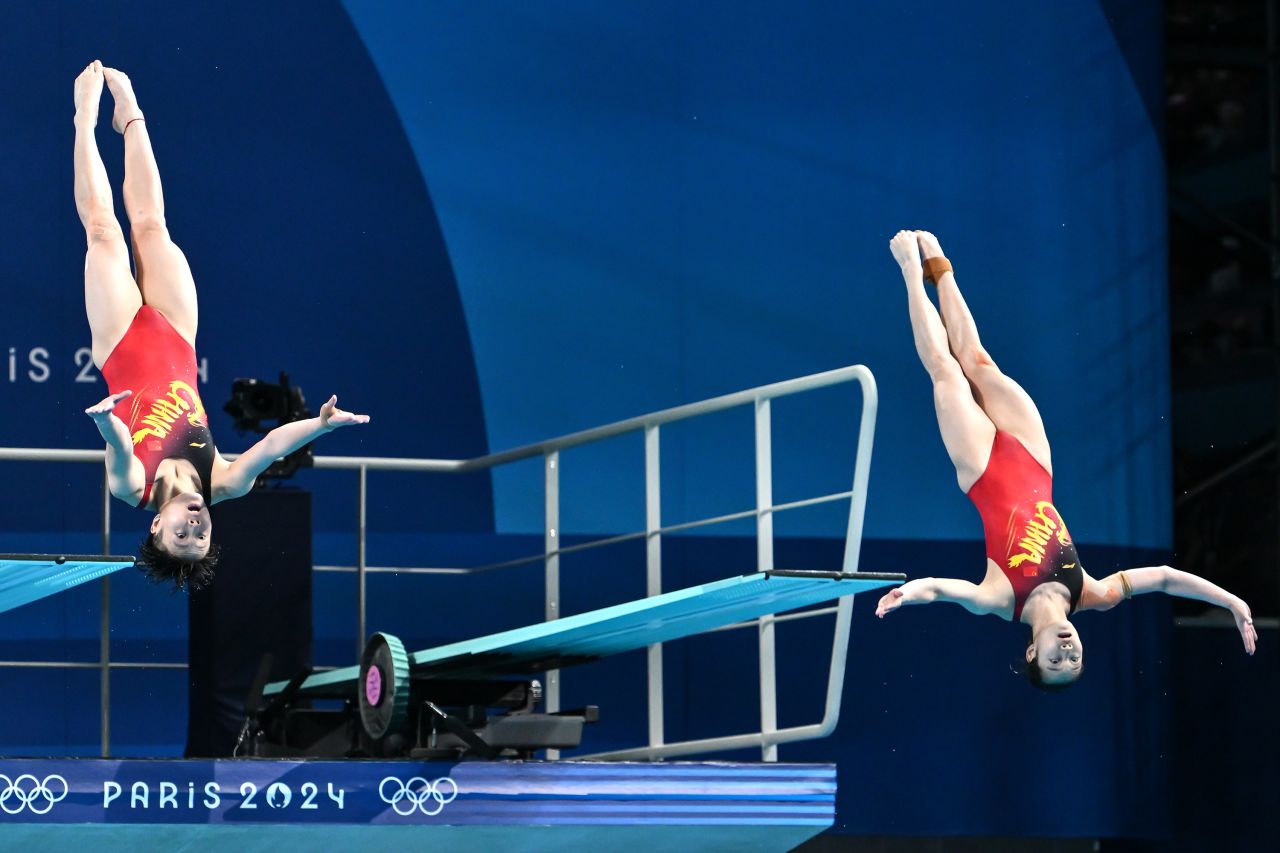 Yani Chang and Yiwen Chen of China competes during Woman's Sinchronised 3m Springboard on day one of the Olympic Games Paris 2024 at Aquatics Centre on July 27.