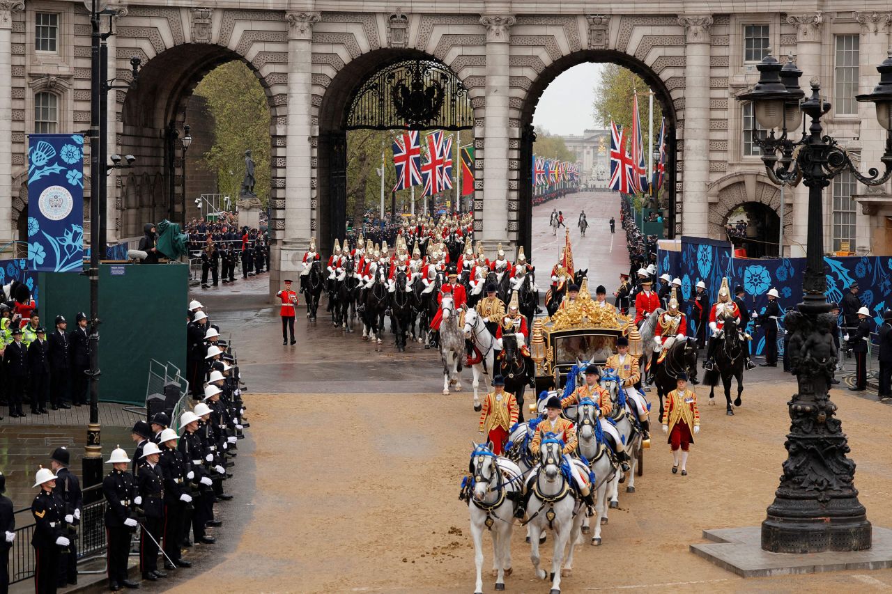 Britain's King Charles III and Queen Camilla travel in the Diamond State Coach to Westminster Abbey.