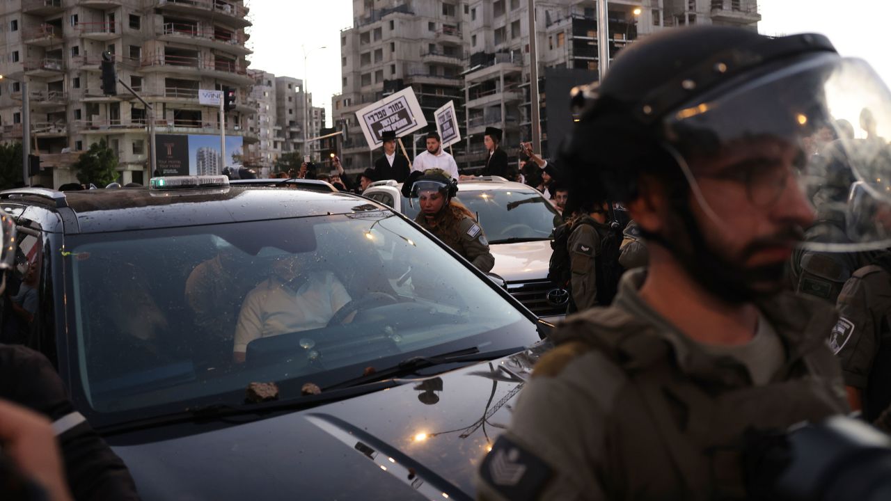 30 June 2024, Israel, Jerusalem: Security forces scuffle with Ultra-Orthodox demonstrators as they attempt to attack Yitzhak Goldknopf, Israel's Housing Minister, during a protest against the IDF draft. Photo by: Ilia Yefimovich/picture-alliance/dpa/AP Images