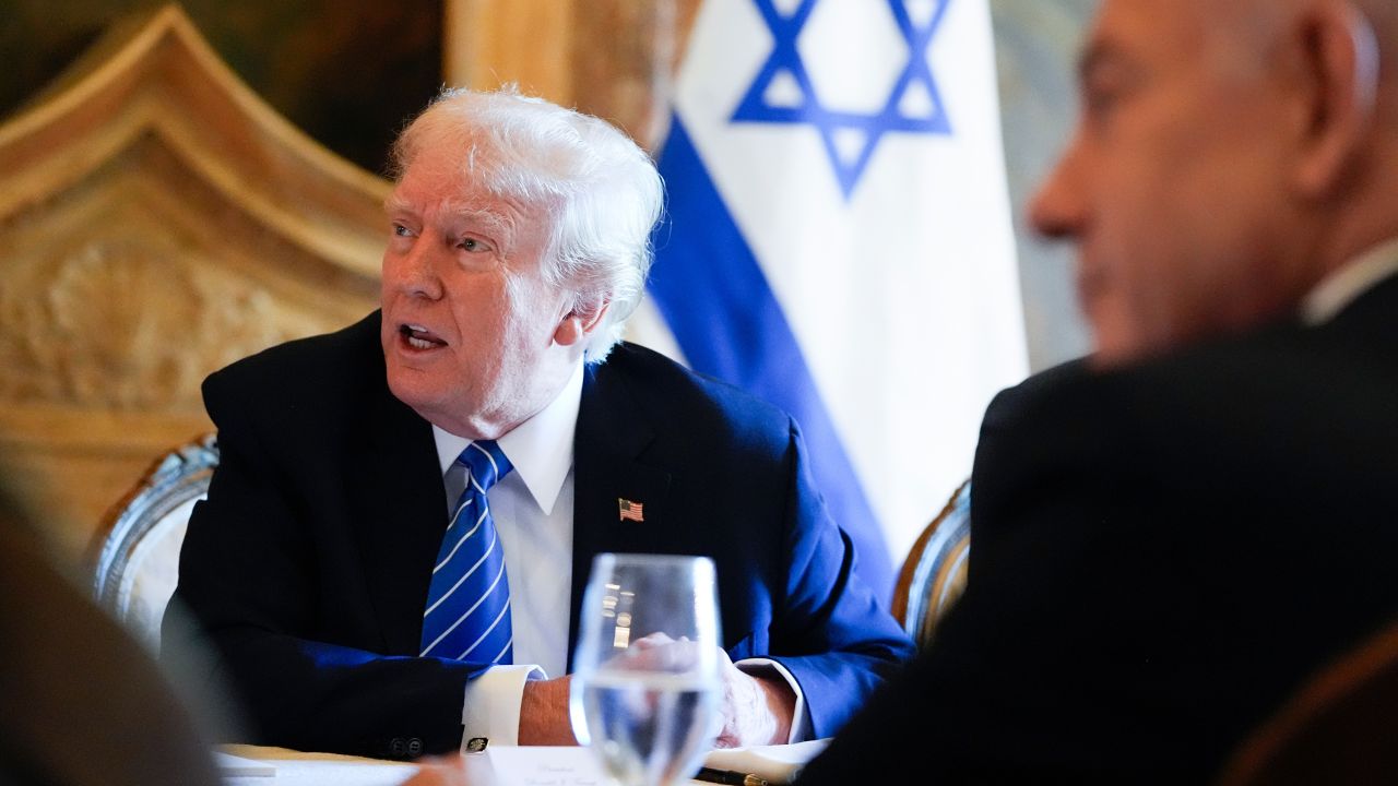 Former President Donald Trump meets with Israeli Prime Minister Benjamin Netanyahu at his Mar-a-Lago estate on Friday in Palm Beach, Florida.