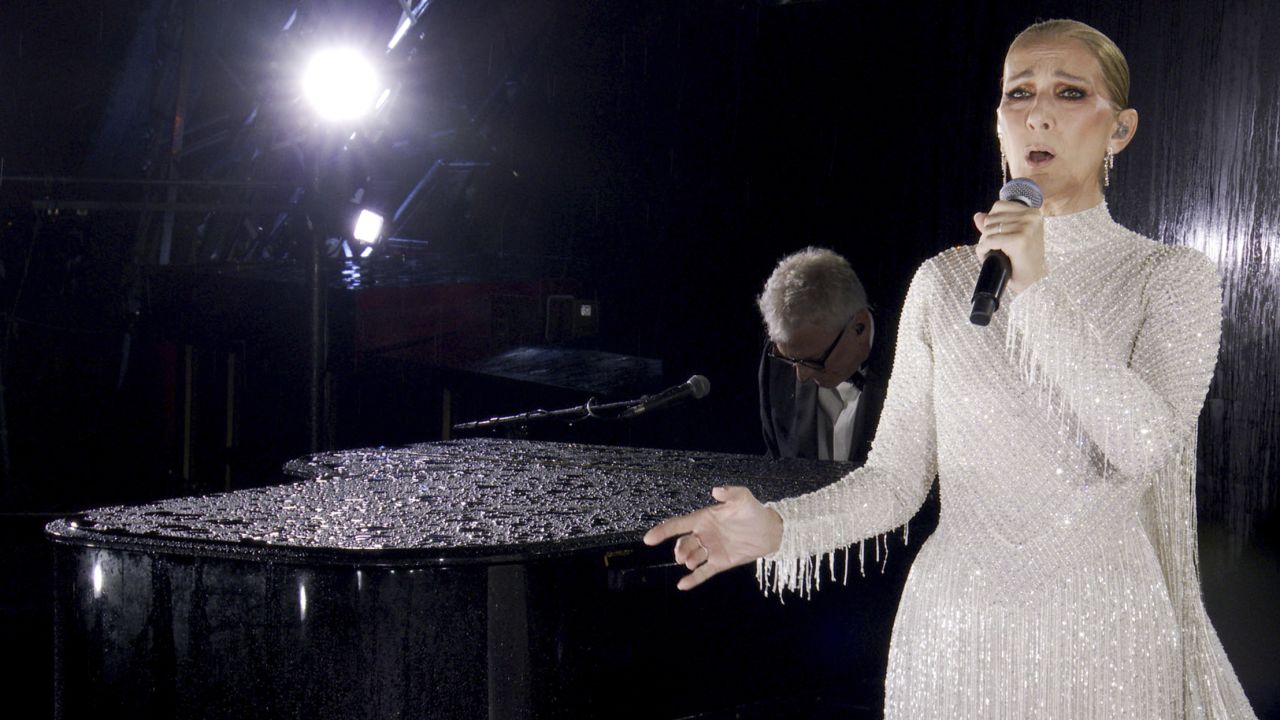 This photo released by the Olympic Broadcasting Services shows Canadian Singer Celine Dion performing on the Eiffel Tower during the opening ceremony for the 2024 Summer Olympics in Paris, France, Friday, July 26, 2024. (Olympic Broadcasting Services via AP)