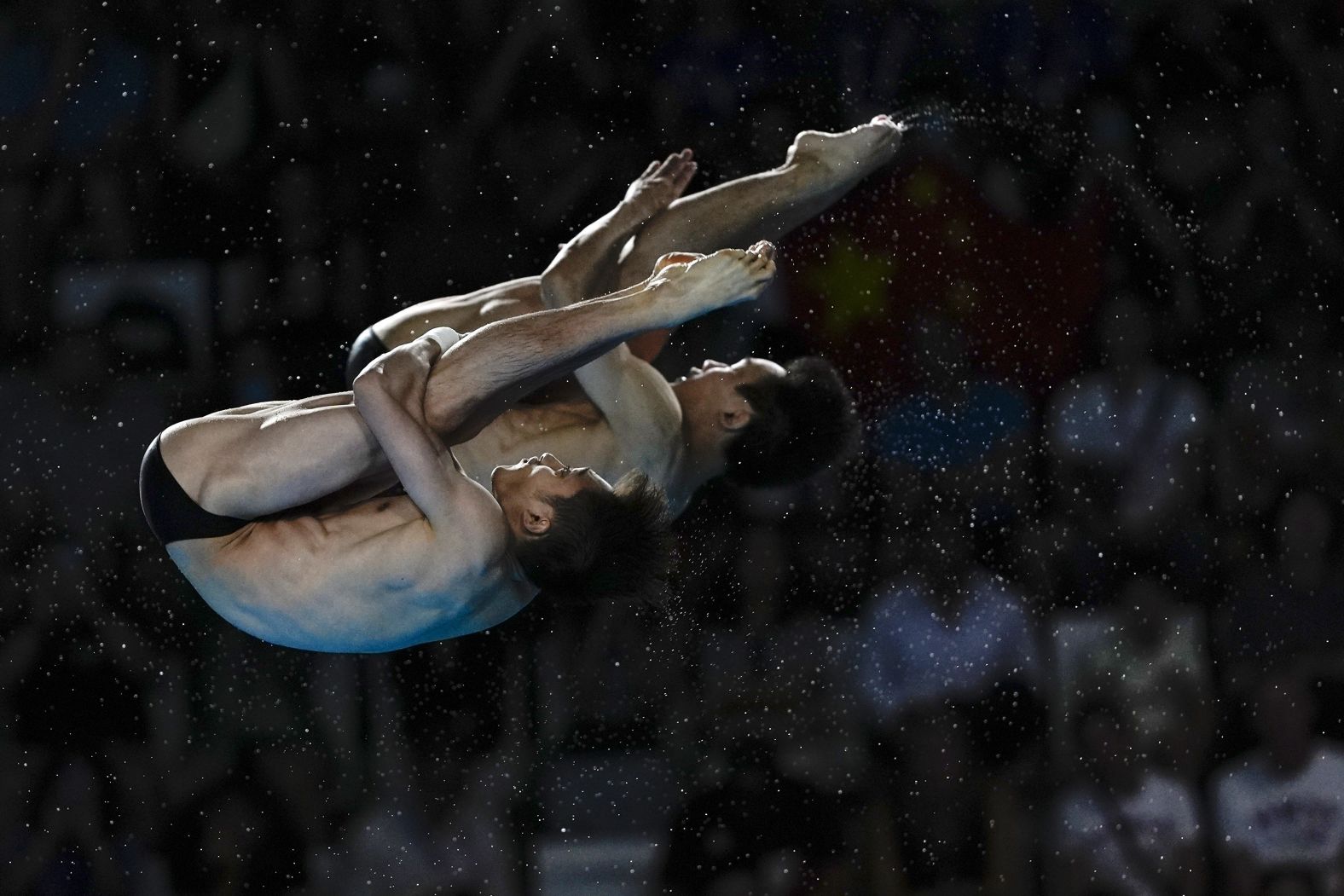 Chinese divers Lian Junjie and Yang Hao compete in the synchronized 10-meter platform event on July 29. The duo <a href="https://www.cnn.com/sport/live-news/paris-olympics-news-2024-07-29#h_1b74e8a24710ae8d977ed3ee2a39aa47">recorded the highest score</a> in every round to win the gold medal.