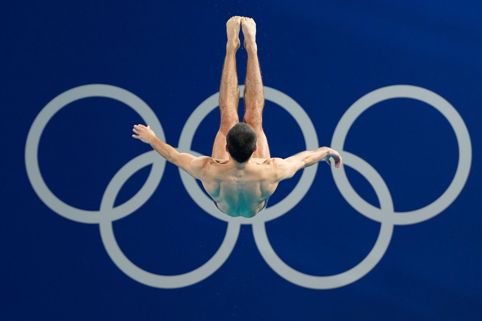 French diver Jules Bouyer competes in the 3-meter springboard event on August 6.