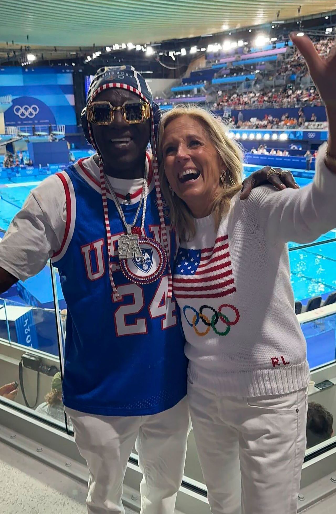 Flavor Flav poses for a photo with US first lady Jill Biden on July 27. 