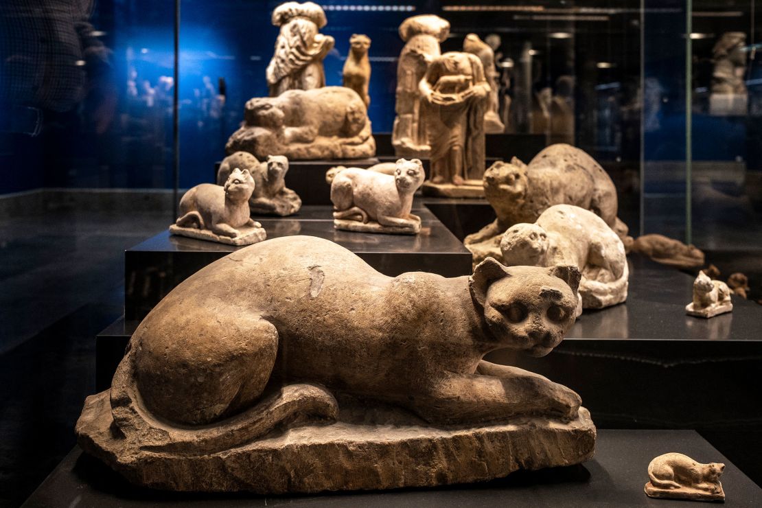 A collection of cat figurines dedicated to the ancient Egyptian deity Bastet is displayed at the Greco-Roman Museum in Egypt's northern coastal city of Alexandria on November 23, 2023.