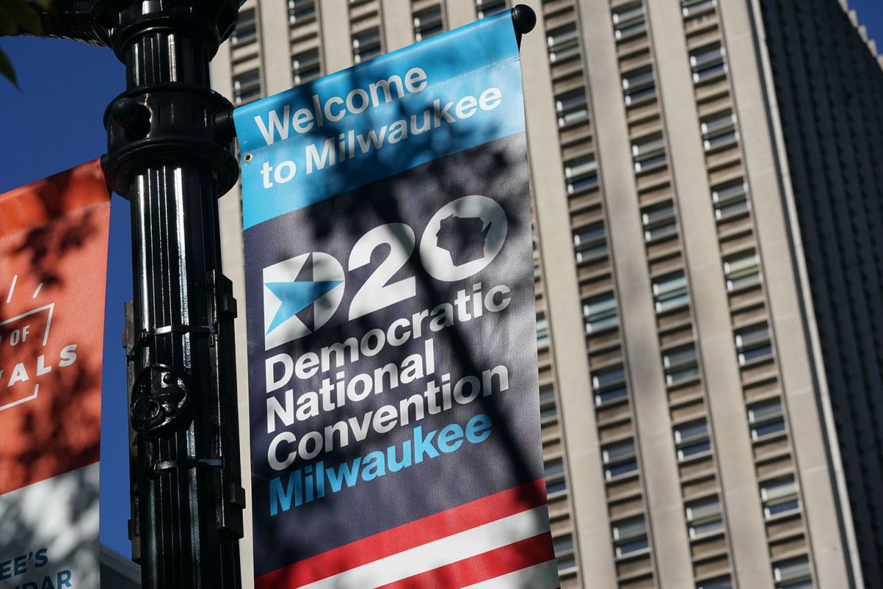 A sign advertises the Democratic National Convention in Milwaukee. The speaker list for the convention has been scaled back significantly after the coronavirus forced Democratic planners to scrap plans for an in-person event in Milwaukee and shrink most of the live programming to two hours each night from 9 p.m. ET to 11 p.m. ET.