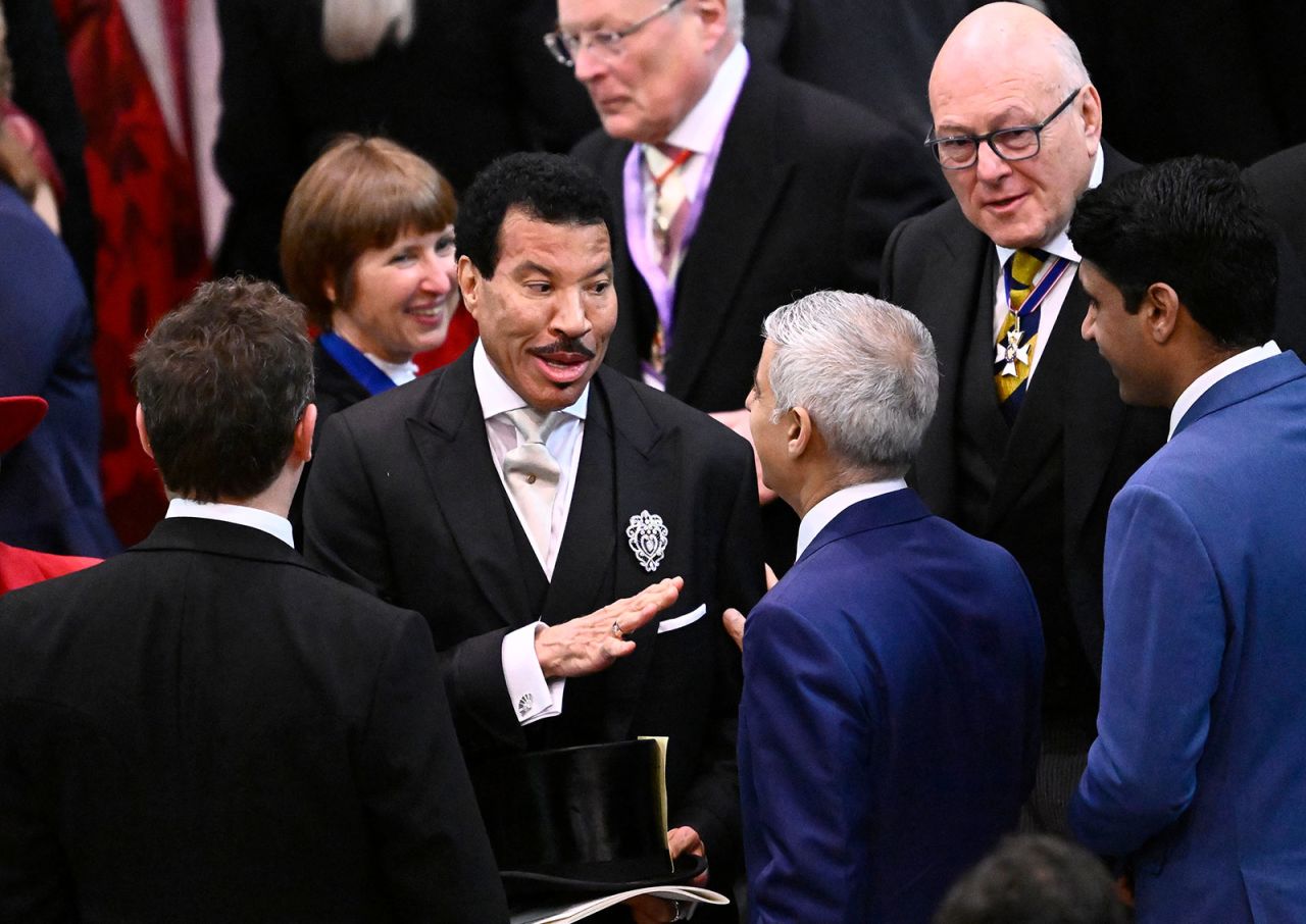 Lionel Richie, center left, arrives at Westminster Abbey on May 6.