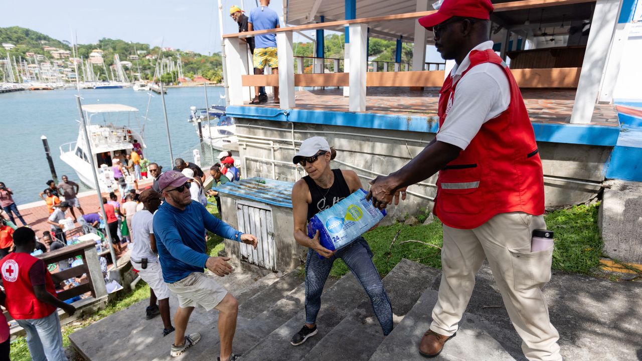 Essential supplies are loaded onto a vessel destined for the island of Carriacou at Grenada Yacht Club in St. George's, Grenada, on July 2. 