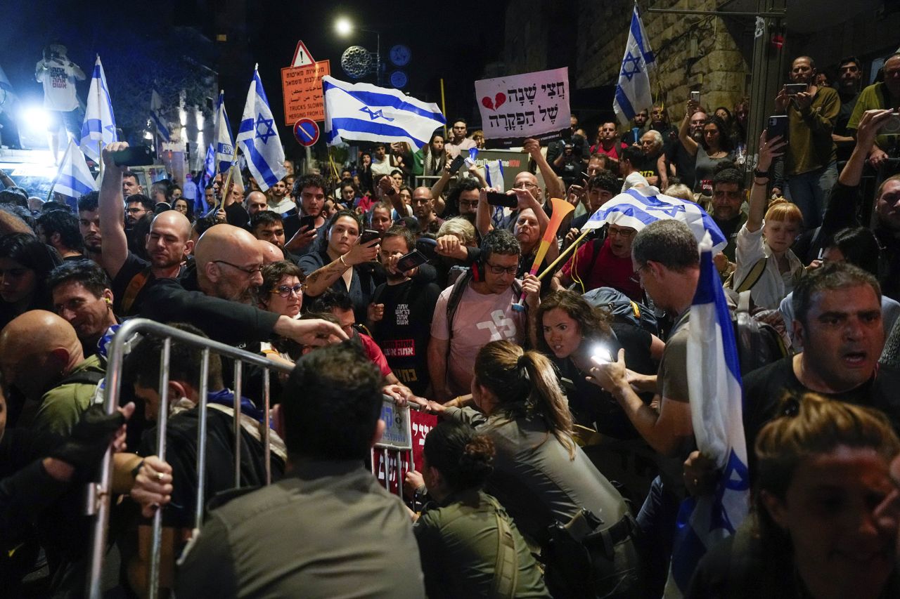 Police try to push back demonstrators in a protest against Israeli Prime Minister Benjamin Netanyahu's government and call for the release of hostages held in Gaza, in Jerusalem, on April 2. 