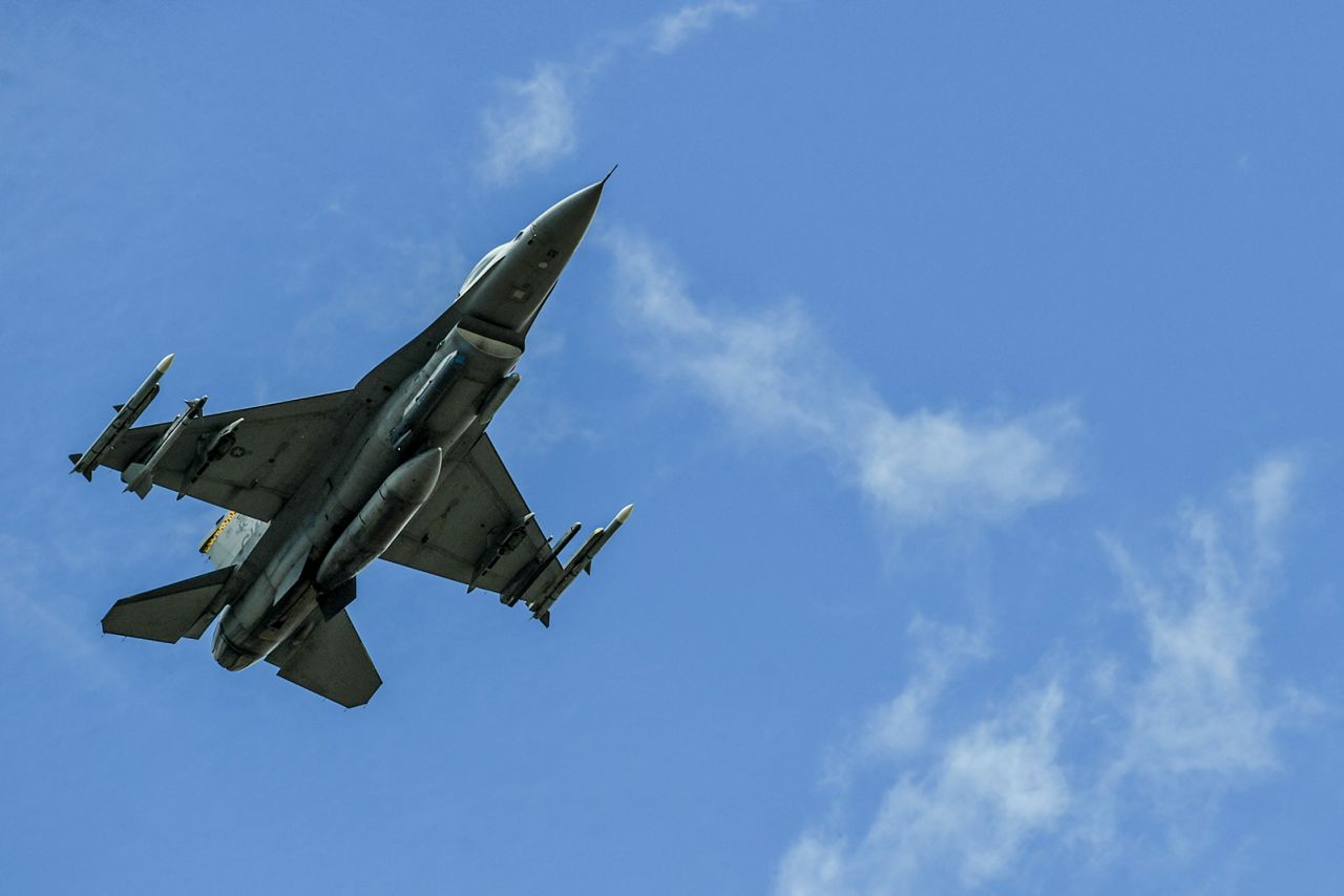 A US Air Force F-16 aircraft flies near the Rionegro Airport during military drills in Rionegro, Colombia on July 12, 2021. 