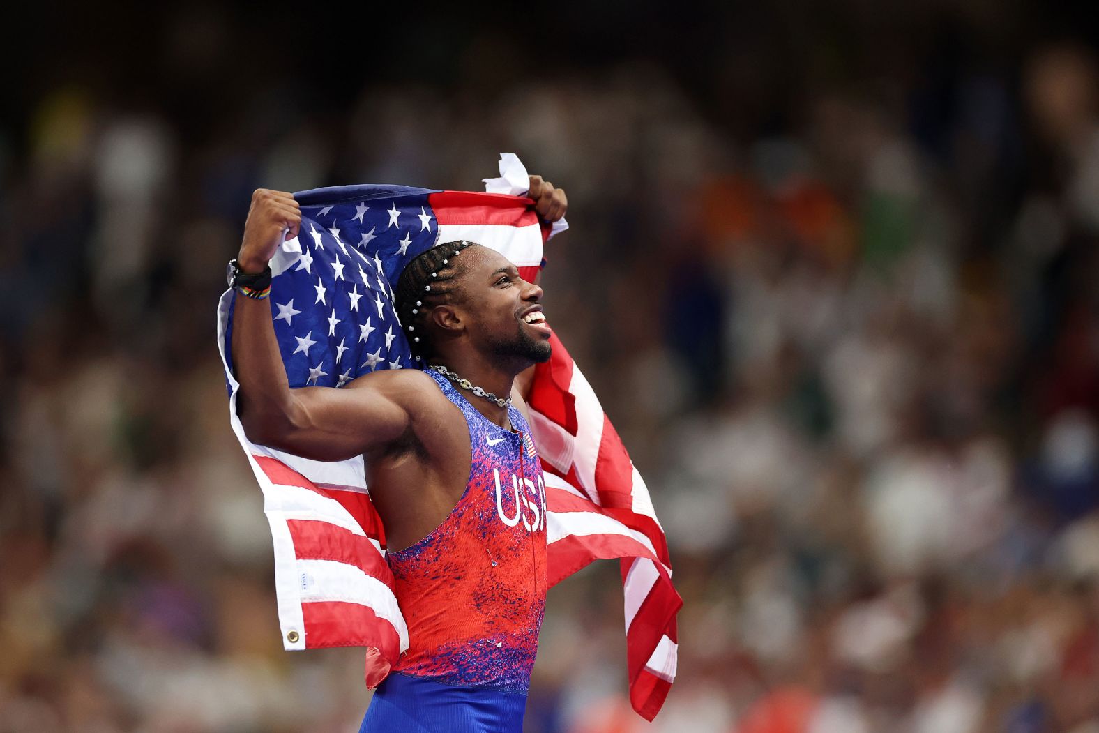 American sprinter Noah Lyles celebrates after he won gold in the 100-meter dash on Sunday, August 4. It was <a href="https://www.cnn.com/sport/live-news/paris-olympics-news-2024-08-04#h_3cb9456f17bdb7beafa32d2d3678f7c1">the first time in 20 years</a> that the United States had won gold in the event.