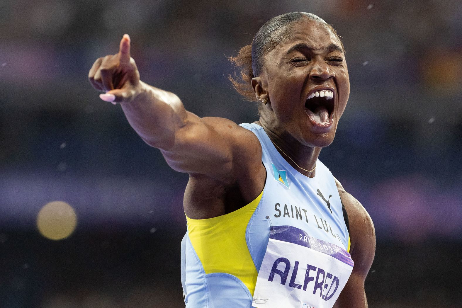 Saint Lucia's Julian Alfred celebrates after <a href="https://www.cnn.com/sport/live-news/paris-olympics-news-2024-08-03#h_40dc9ed1a9773dbb45d0bdbbdf57d1ea">winning gold in the 100-meter dash</a> on August 3. It was her country's first Olympic medal.