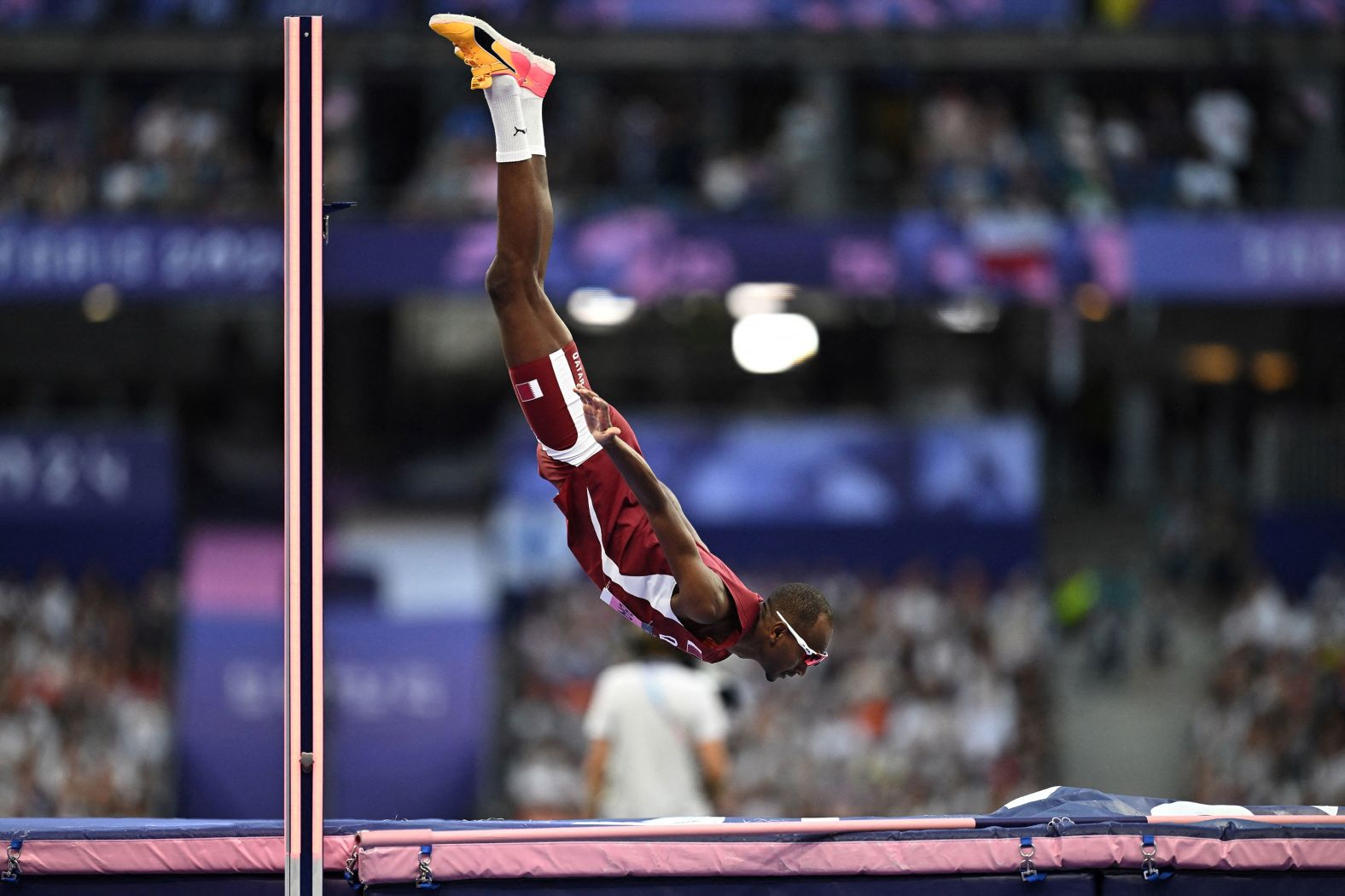 Qatar's Mutaz Essa Barshim competes in the high jump final on August 10. He finished with the bronze three years after tying for the gold in Tokyo.