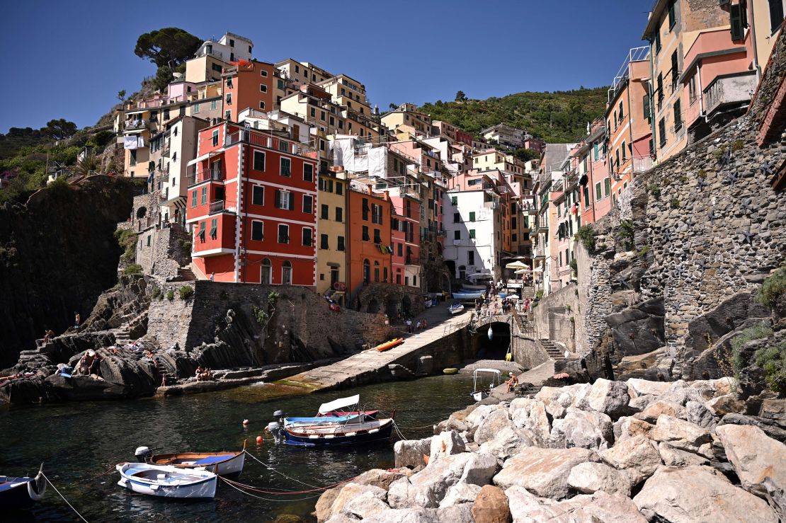 Brightly colored buildings are seen in the village of Riomaggiore, one of the five villages comprising Cinque Terre. The "Path of Love" runs from here to Manarola.