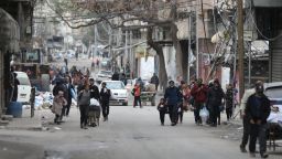 GAZA CITY, GAZA - MARCH 18: Palestinian residents leave the area with a few items after the Israeli army forces besiege the Al-Shifa hospital with tanks and heavy gunfire in Gaza City, Gaza on March 18, 2024. (Photo by Dawoud Abo Alkas/Anadolu via Getty Images)