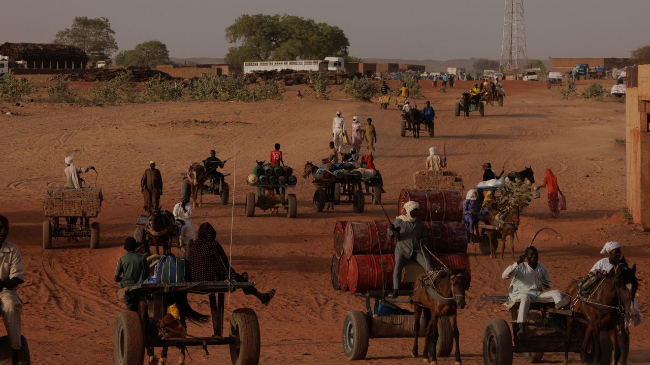 ADRE, CHAD - APRIL 25:  Goods move back and forth on horseback across the border between Sudan and Chad on April 25, 2024 in Adre, Chad. Since the beginning of the recent conflict between the paramilitary Rapid Support Forces (RSF) and the the Sudanese Armed Forces, (SAF), which began in March 2023, over 600,000 new refugees have crossed the border from Darfur in Sudan, into Chad. The total number of refugees, including those from previous conflicts, now stands at 1.2 million. Aid agencies, including The World Food Programme, (WFP), MÃ©decins Sans FrontiÃ¨res (MSF) and the United Nations High Commissioner for Refugees, (UNHCR), already struggling with acute supply shortages, have warned that the life-saving programmes in Chad, will âgrind to a halt in a matter of weeks without urgent fundingâ. Chad is now home to one of the largest and fastest-growing refugee populations in Africa.  (Photo by Dan Kitwood/Getty Images)