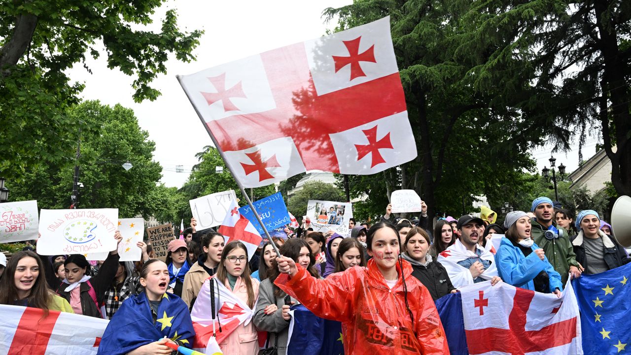 Georgian demonstrators protest the controversial "foreign influence" bill in Tbilisi on May 14, 2024. Georgian parliament is set to adopt a "foreign influence" bill despite mass protests against a law criticised for mirroring repressive Russian legislation. The bill requires non-governmental organisations and media outlets that receive more than 20 percent of their funding from abroad to register as bodies "pursuing the interests of a foreign power." (Photo by Vano SHLAMOV / AFP) (Photo by VANO SHLAMOV/AFP via Getty Images)