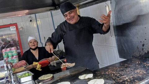 Chef Arturo Rivera Martinez prepares tacos at Taqueria El Califa de Leon restaurant in Mexico City on May 15, 2024. A hole-in-the-wall taqueria is among the first restaurants in Mexico to be awarded a star by the prestigious Michelin Guide -- an accomplishment its owner credits to "love and effort".