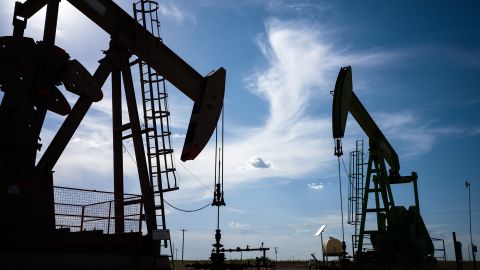 Oil pump jacks are shown in a field on June 27, 2024 in Stanton, Texas.