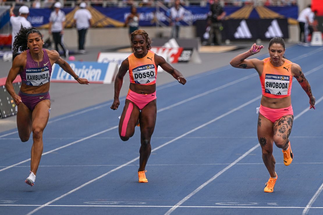 Swiss runner Mujinga Kambundji shown in a women's 100m Olympics tune-up race this month against Italy's Zaynab Dosso of Italy and Ewa Swoboda of Poland on July 8, 2024 in Paris, France.