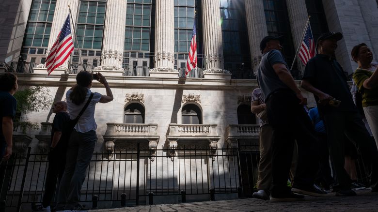 People walk through the Financial District near the New York Stock Exchange on July 11, 2024 in New York City.