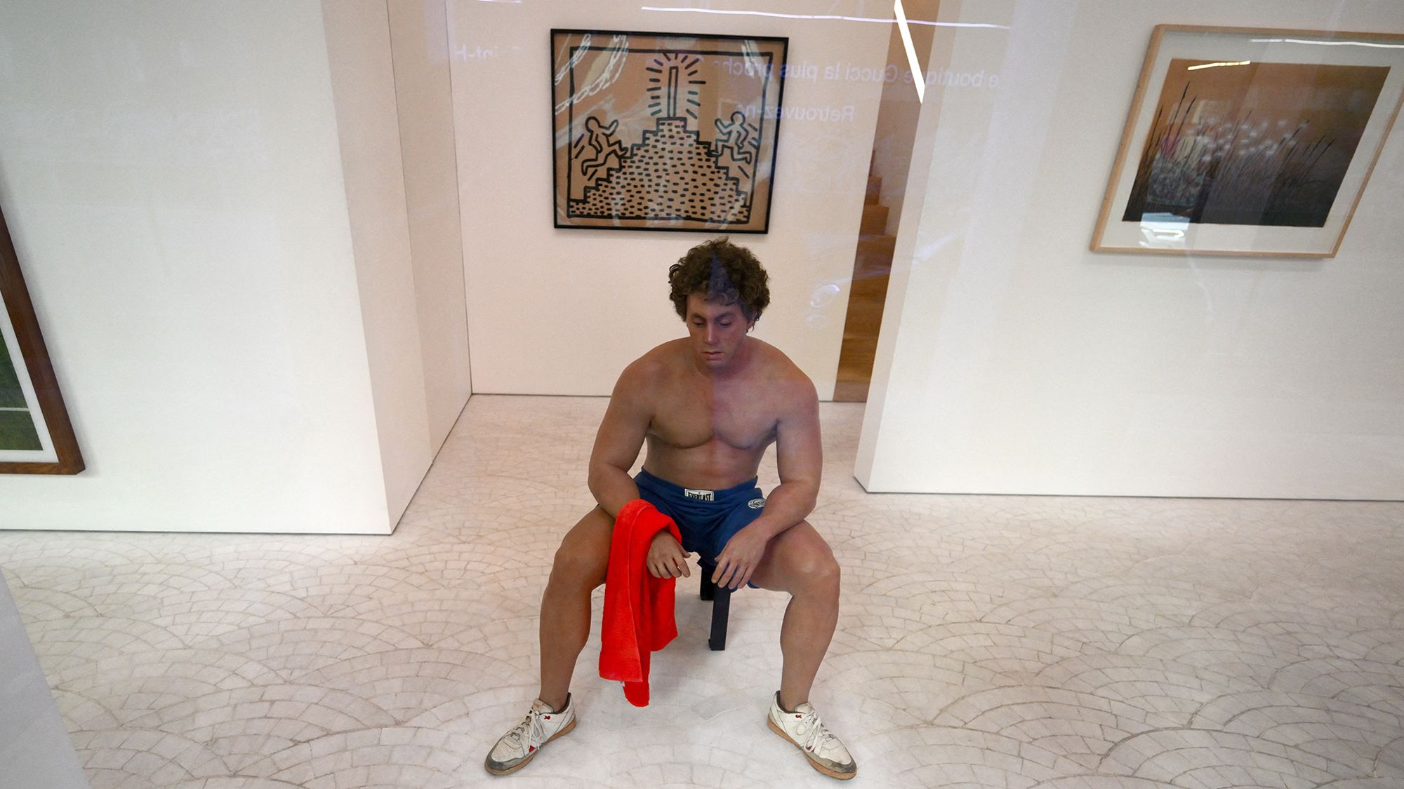 "Bodybuilder," by US artist Duane Hanson is on display in the window at the Gagosian gallery in Paris ahead of the Paris 2024 Olympic and Paralympic games.