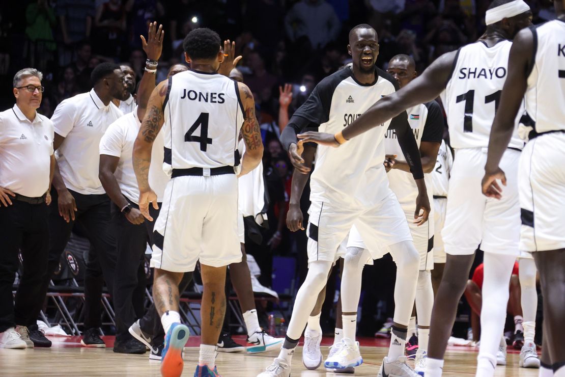 South Sudan players celebrate during the game against Team USA.