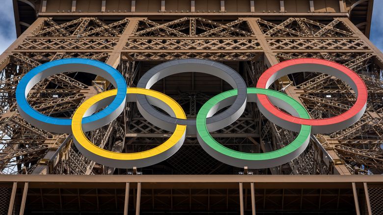 PARIS, FRANCE - JULY 22: The Olympic rings are seen on the Eiffel Tower amid preparations for the upcoming Paris 2024 Olympic Games in Paris, France on July 22, 2024. Paris, renowned for its cultural landmarks, is set to host a pivotal moment in sporting history as it prepares to welcome the world to the 2024 Olympic Games. (Photo by Aytac Unal/Anadolu via Getty Images)