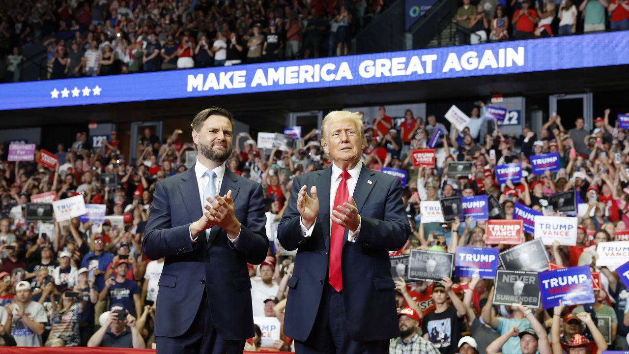 GRAND RAPIDS, MICHIGAN - JULY 20: Republican presidential nominee, former U.S. President Donald Trump stands onstage with Republican vice presidential candidate, Sen. J.D. Vance (R-OH) during a campaign rally at the Van Andel Arena on July 20, 2024 in Grand Rapids, Michigan. Trump's campaign event is the first joint event with Vance and the first campaign rally since the attempted assassination attempt his rally in Butler, Pennsylvania. (Photo by Anna Moneymaker/Getty Images)