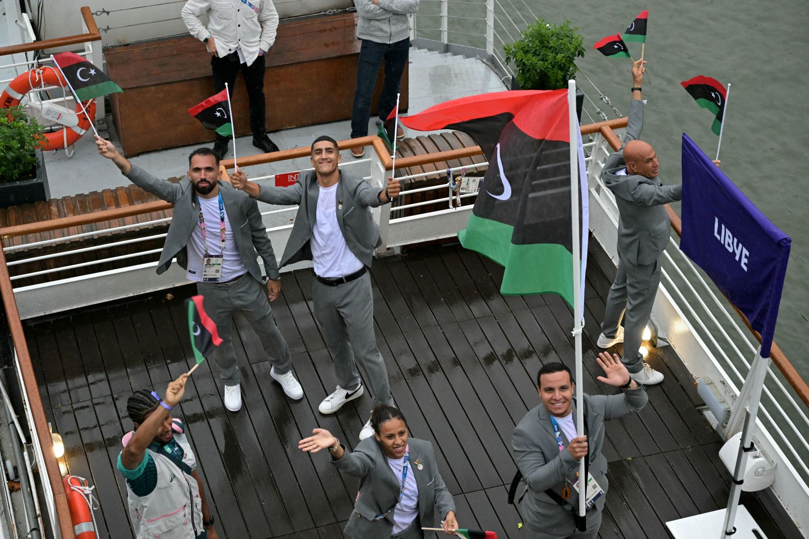 Libyan athletes participate in the Parade of Nations. Some nations shared the same boat.