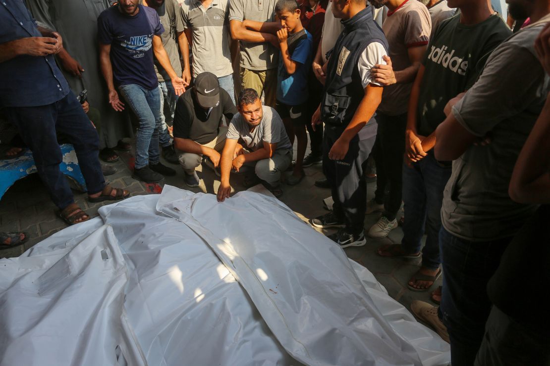 Bodies of Palestinian, including children, are brought to al-Aqsa Martyrs Hospital after Israeli attack on Al-Qashtat family house in Deir al-Balah, Gaza on July 27, 2024.