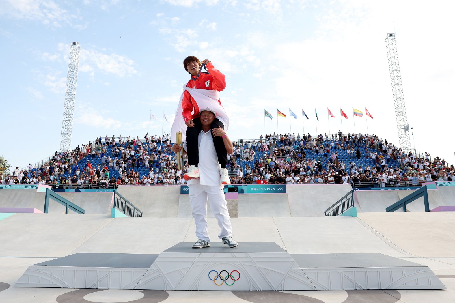 Japanese skateboarder Yuto Horigome celebrates with his gold medal after <a href="https://www.cnn.com/sport/live-news/paris-olympics-news-2024-07-29#h_11b6d4fa703b70686f3cb7b8e1ee5d5c">winning the street competition</a> on July 29. Horigome also won the event at the Tokyo Olympics three years ago.