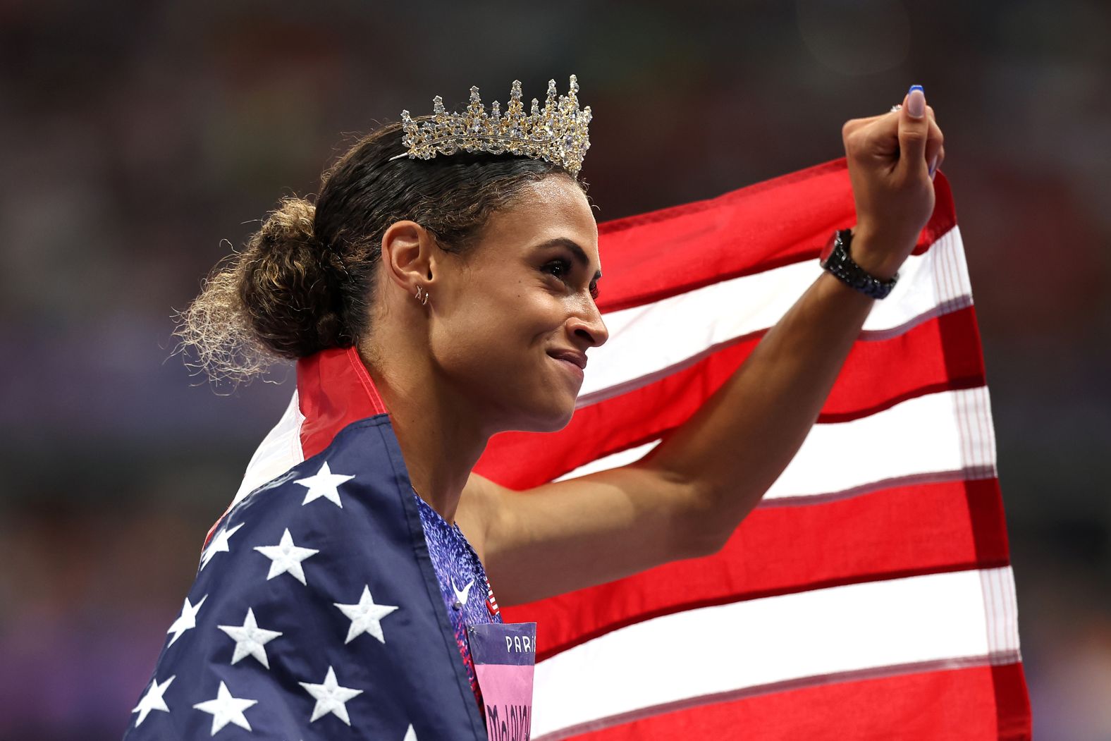 US athlete Sydney McLaughlin-Levrone wears a crown after <a href="https://www.cnn.com/sport/live-news/paris-olympics-news-2024-08-08#h_7a468b4b00d98096456b06d1f376ab1a">winning the 400-meter hurdles</a> and smashing her own world record on Thursday, August 8. She finished in 50.37 seconds, dominating the field to win gold for the second straight Olympics.