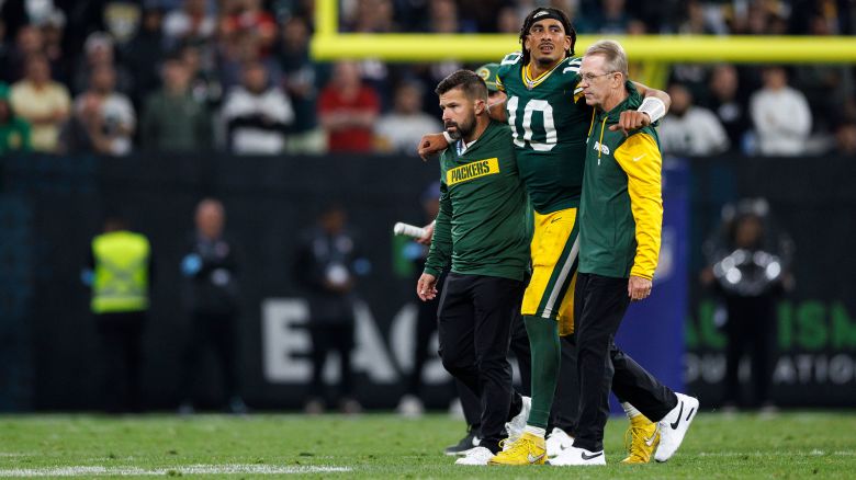 SÃO PAULO, BRAZIL - SEPTEMBER 7: Quarterback Jordan Love #10 of the Green Bay Packers walks off the field due to an apparent injury during the fourth quarter of an NFL football game against the Philadelphia Eagles, at Arena Corinthians on September 7, 2024 in Sao Paulo, Brazil. (Photo by Brooke Sutton/Getty Images)