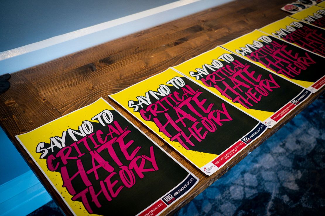 Signs reading "Say No To Critical Hate Theory" laid out during a Save Our Schools rally in Leesburg, Virginia, in September 2021. 