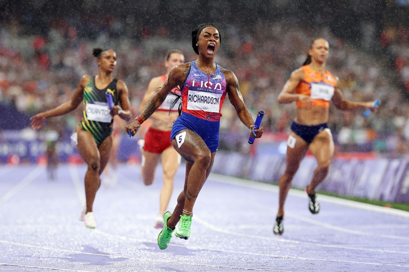 US sprinter Sha'carri Richardson celebrates after crossing the finish line <a href="https://www.cnn.com/sport/live-news/paris-olympics-news-2024-08-09#h_016f5464364b1ffeaaf67d5195f8045d">to win gold in the women's 4x100 relay</a> on August 9.