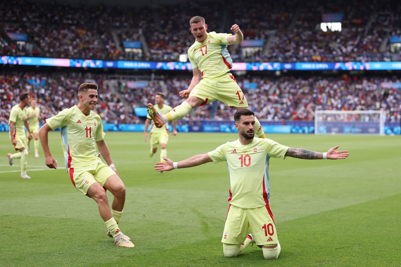 Spain's Álex Baena (No. 10) celebrates after scoring a goal to put his team up 3-1 in the soccer final against France on August 9. France fought back to tie the match and force extra time, but <a href="https://www.cnn.com/sport/live-news/paris-olympics-news-2024-08-09#h_d66711a81d2f406b9513517ae7f36b66">Spain went on to win 5-3</a>.