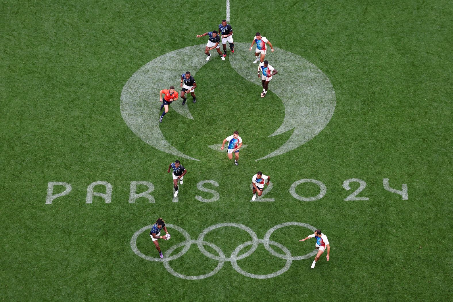 Fiji's Selestino Ravutaumada carries the ball during the rugby sevens final against France on July 27. France won the match for <a href="https://www.cnn.com/sport/live-news/paris-olympics-news-2024-07-27#h_d459e9fe5b9949f1ac2cee5f45330804">its first gold medal of these Games</a>.