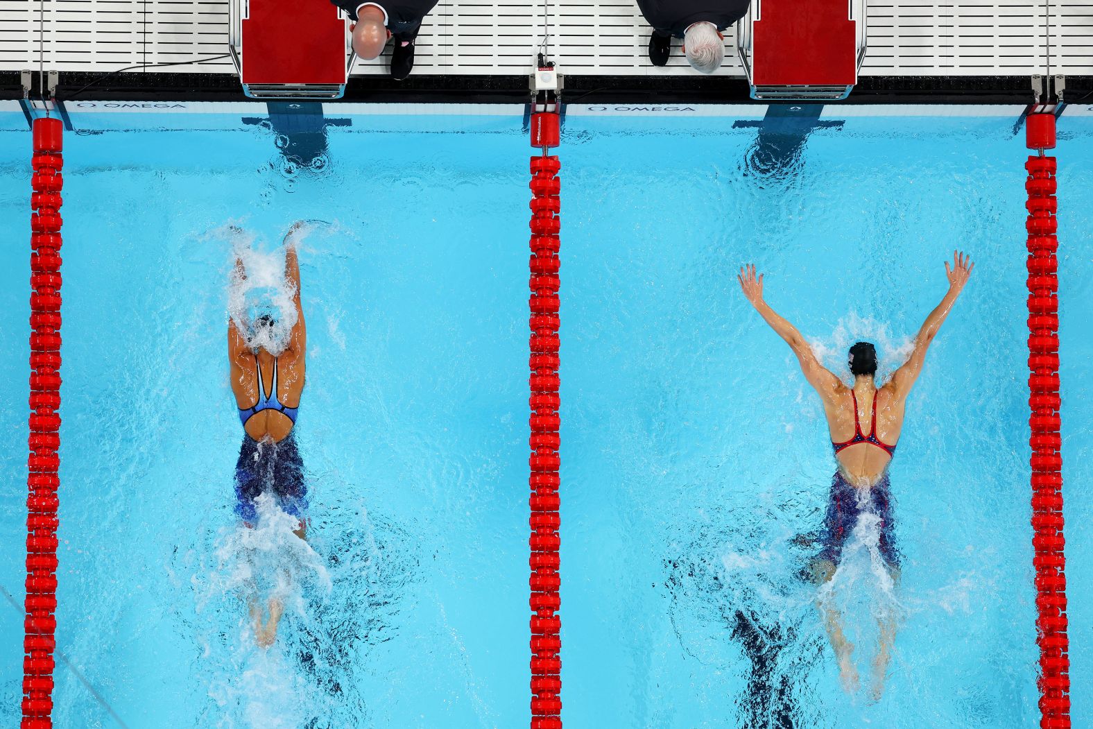 American swimmer Torri Huske, left, edges teammate Gretchen Walsh as they <a href="https://www.cnn.com/sport/live-news/paris-olympics-news-2024-07-28#h_47d44f200db29e1a92041cc0698e034b">finish 1-2 in the 100-meter butterfly</a> on July 28.