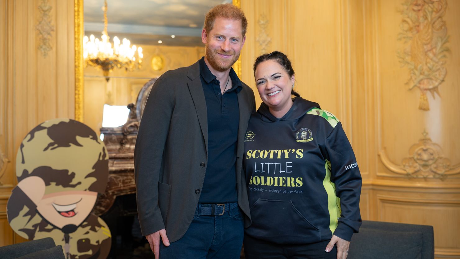 Prince Harry, Duke of Sussex (left) and Nikki Scott, founder of the Scotty's Little Soldiers charity (right)