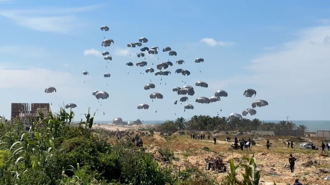 Footage obtained by CNN shows hundreds of Palestinians rushing to the site of the aid drop in Beit Lahia, in northern Gaza.