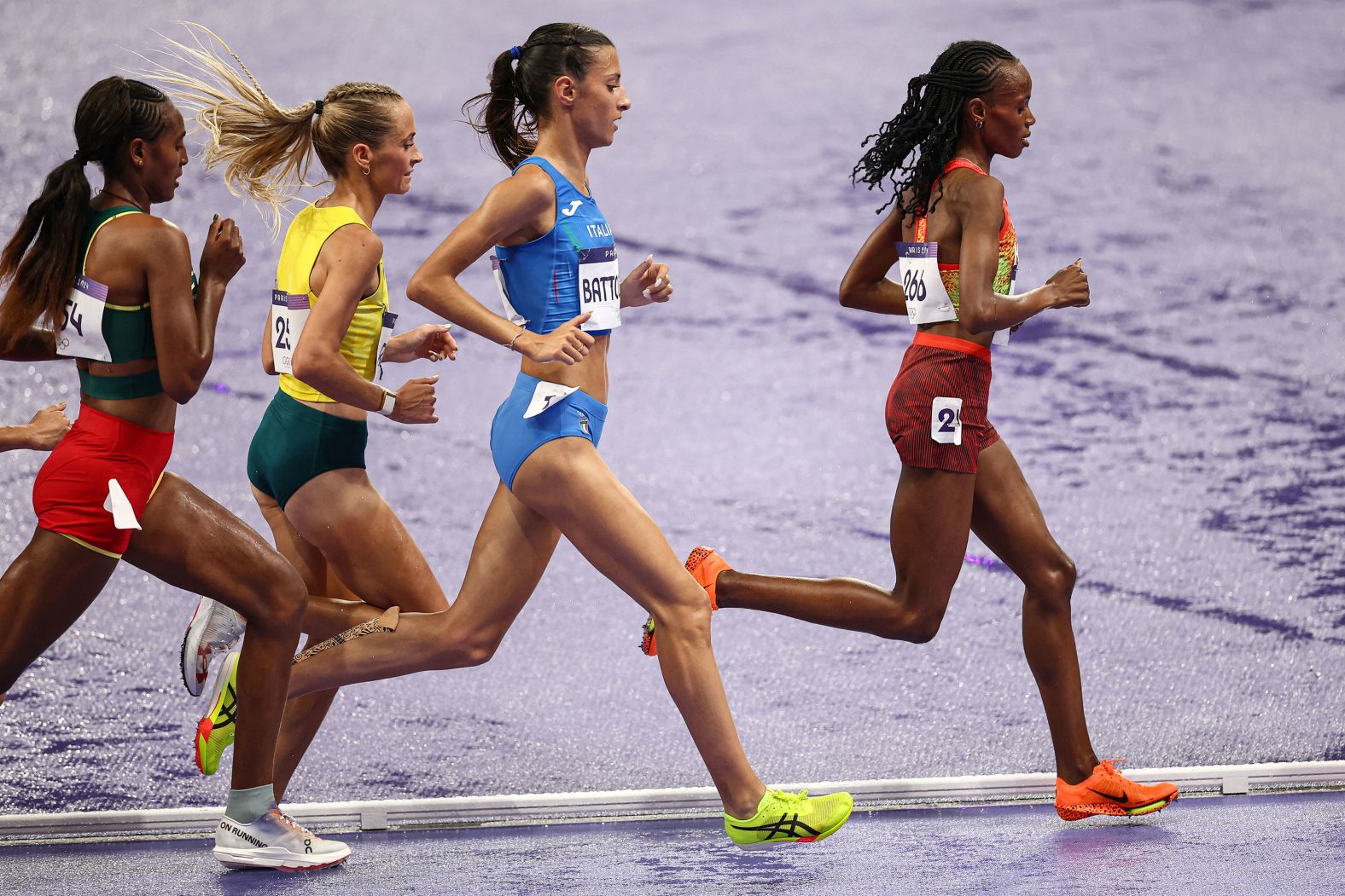 Kenya's Beatrice Chebet leads the pack during the 10,000-meter final on August 9. <a href="https://www.cnn.com/sport/live-news/paris-olympics-news-2024-08-09#h_cf5994c189395d655e8f6917b18aeb87">Chebet won another gold medal</a> to go with the one she won in the 5,000 meters.