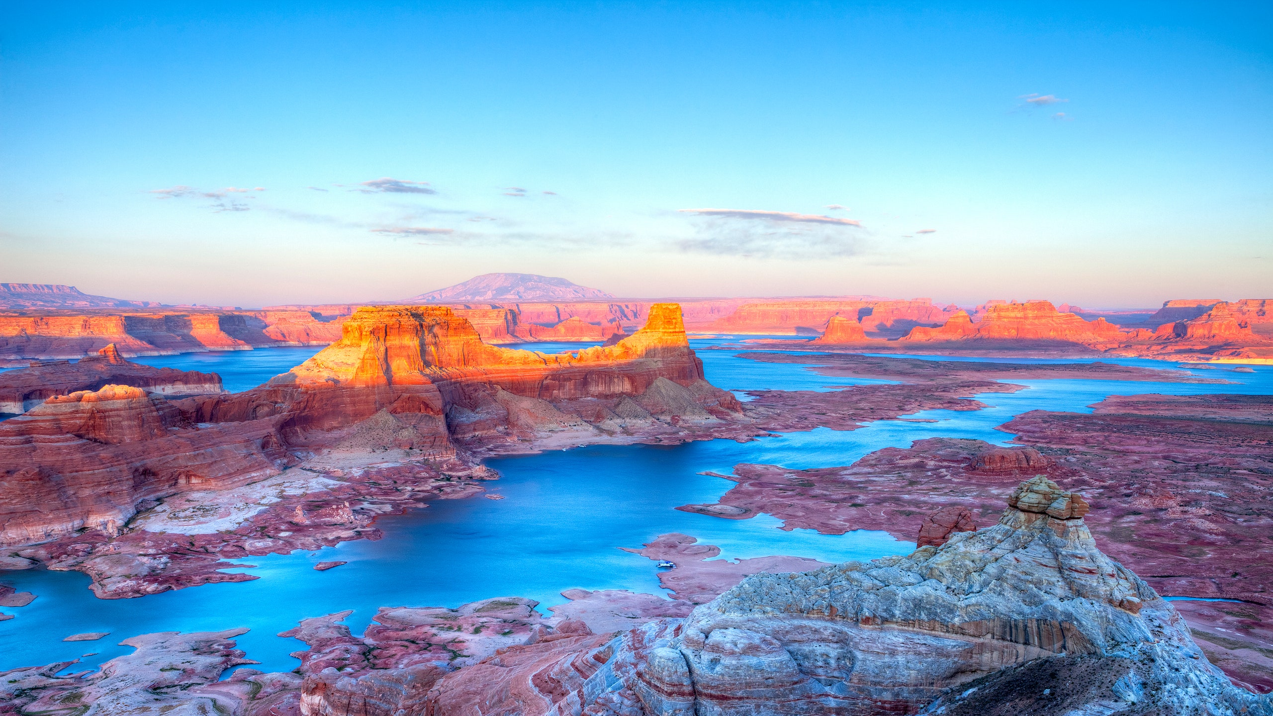 Sunset lit Gun Sight Butte in Lake Powell