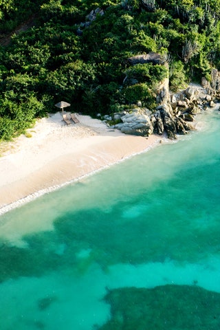 Directly south of Tortola is the largest private island in the British Virgin Islands. Owned by the Van Andel family ...