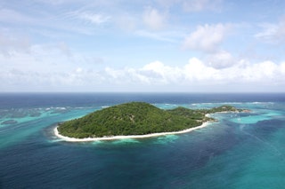 Petit St Vincent is a private islet of just 135 acres in the Grenadines the southernmost of the Lesser Antilles an...