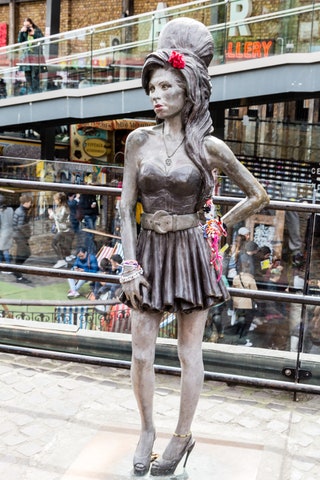 SEE THE MANY AMY WINEHOUSE MEMORIALS    Brightly coloured tributes to the areas muchmissed most recent legend Amy...