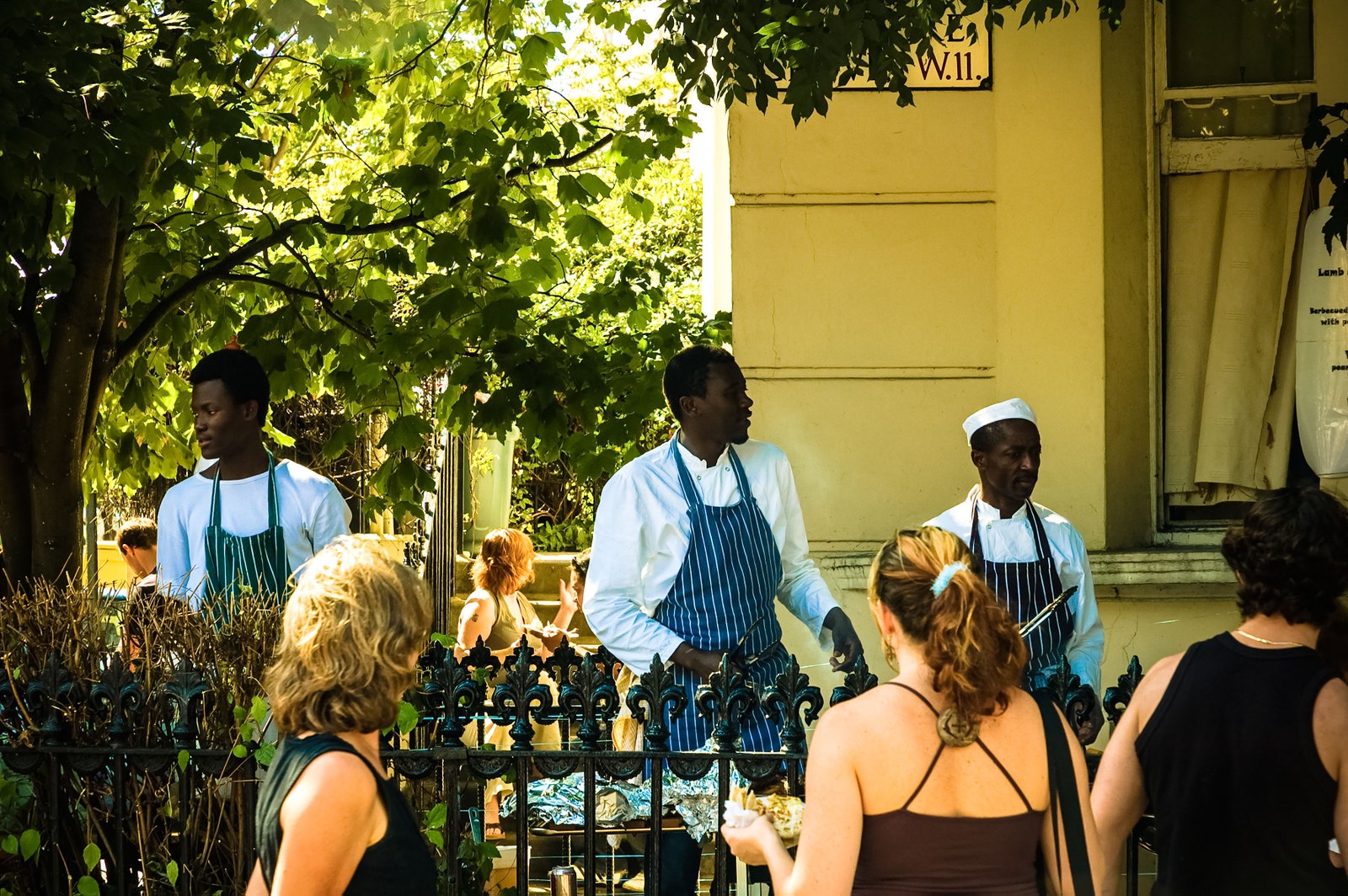 Chefs cooking at Notting Hill carnival