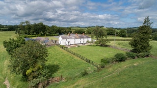 Image may contain Outdoors Countryside Farm Field Nature Pasture Rural Architecture Building and Housing