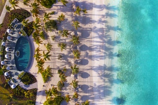 Image may contain Nature Outdoors Sea Water Pool Swimming Pool Coast Shoreline Aerial View and Plant